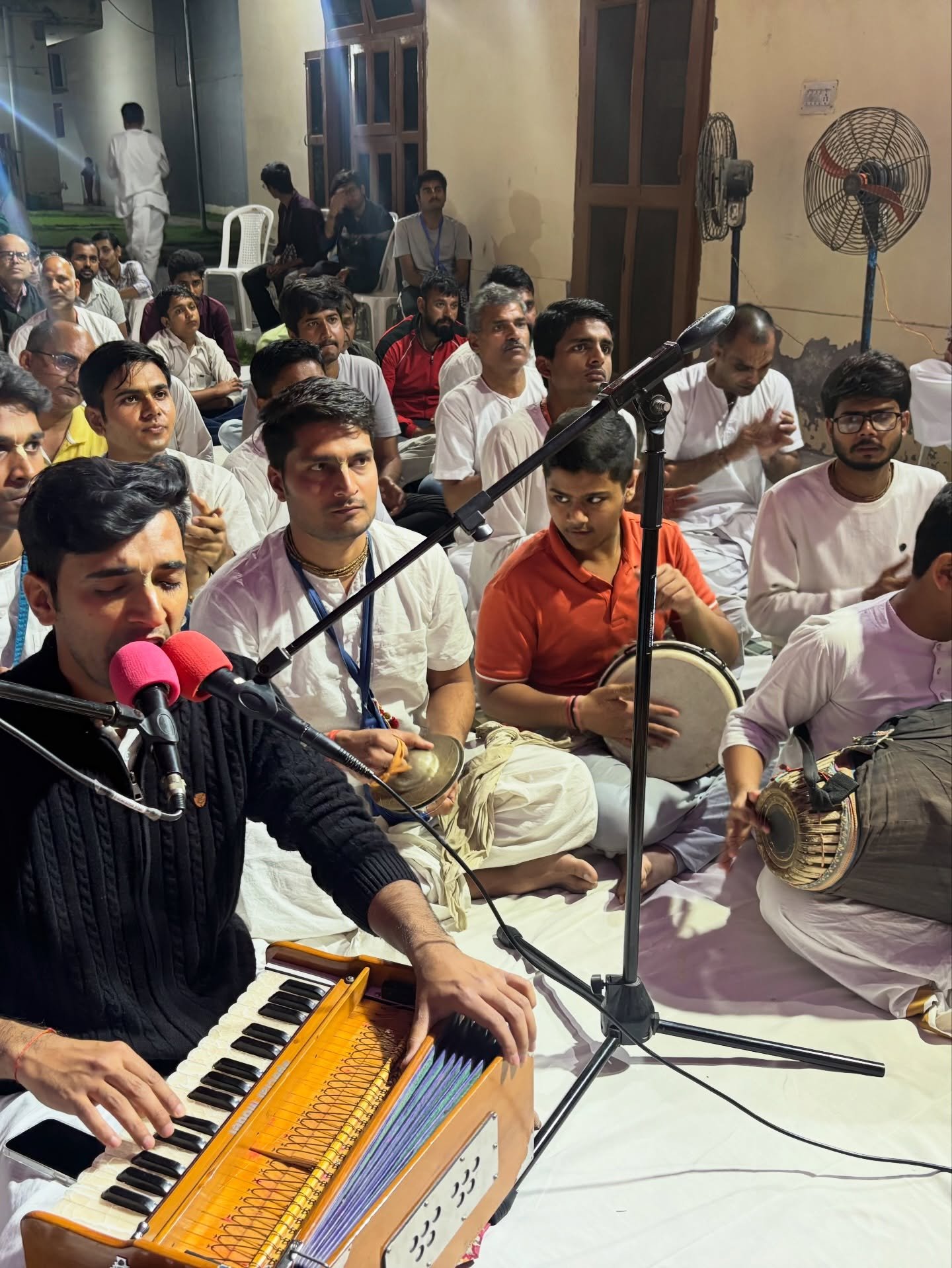 Devotees performing kirtan at ISKCON Rewari